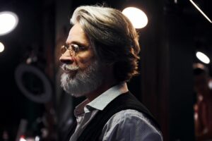 stylish-modern-senior-man-with-gray-hair-and-beard-2023-11-27-04-52-41-utc.jpg